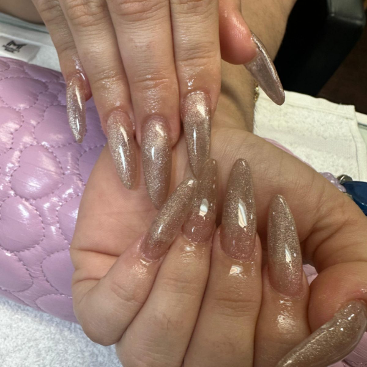 Nude glitter nails with almond shape
